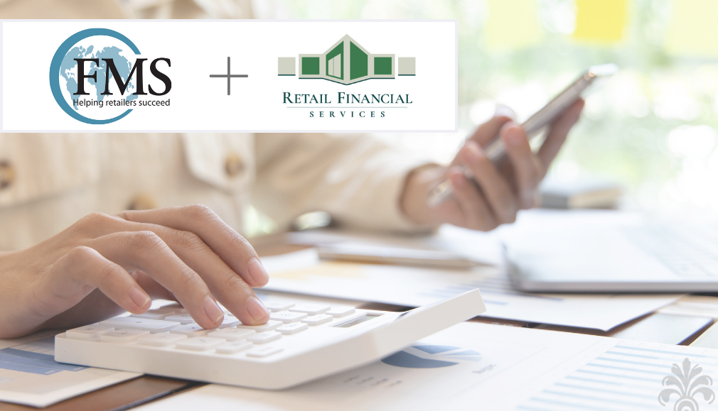 Close-up of a person using a calculator and holding a smartphone, with a graphic above showing the FMS Solutions and Retail Financial Services logos side by side, highlighting an acquisition or collaboration between the two companies.