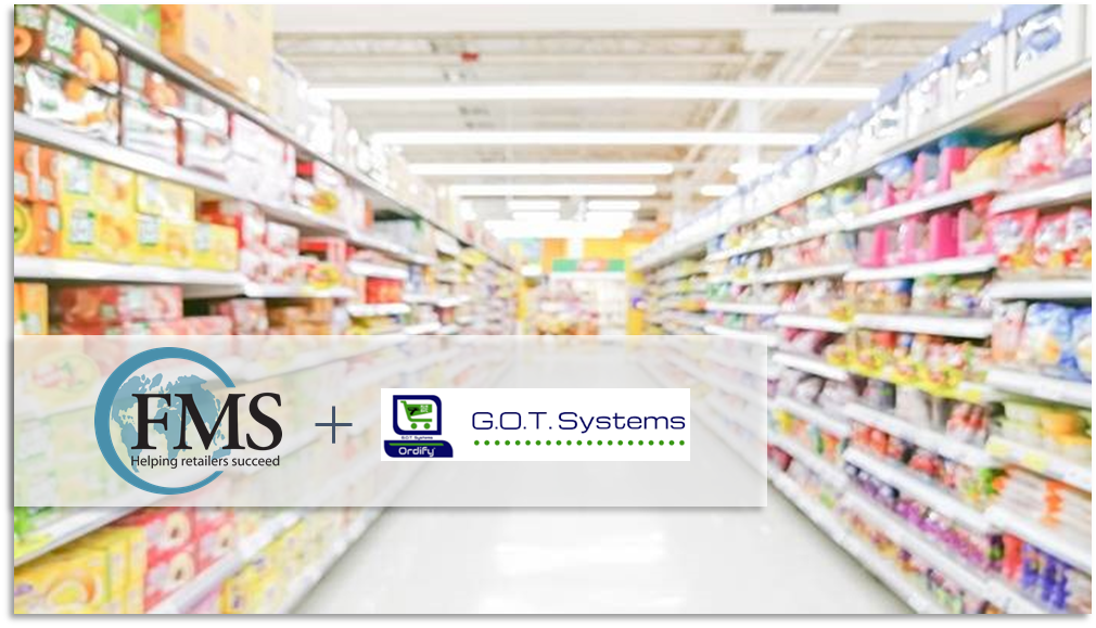 A supermarket aisle with shelves of assorted products. In the foreground, a semi-transparent overlay displays the FMS Solutions and GOT Systems logos side by side, highlighting their recent acquisition with a plus sign between them.