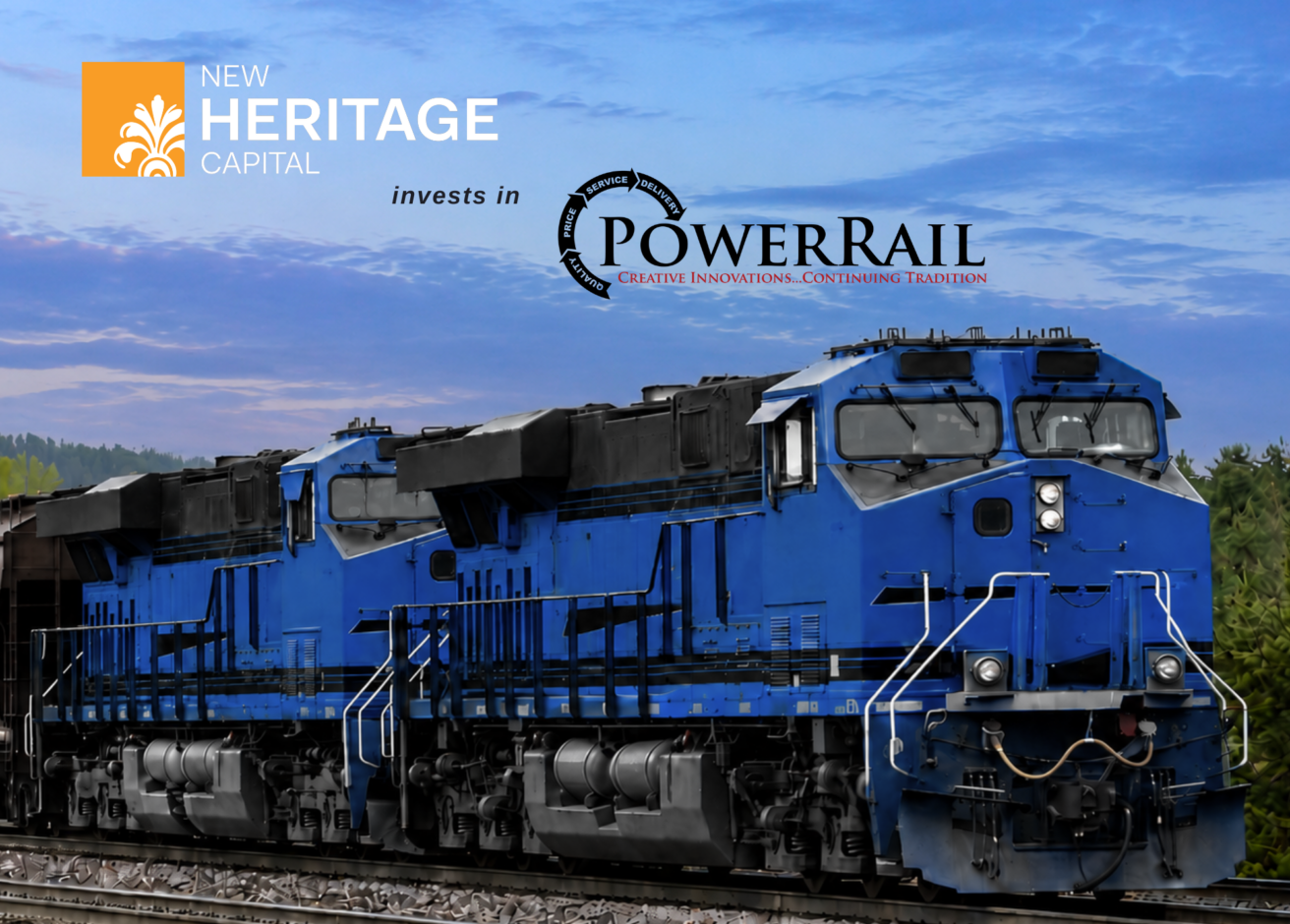 Two blue trains sit on tracks with trees in the background. “New Heritage Capital invests in PowerRail” appears at the top alongside company logos, highlighting a new strategic partnership. The sky is partly cloudy.